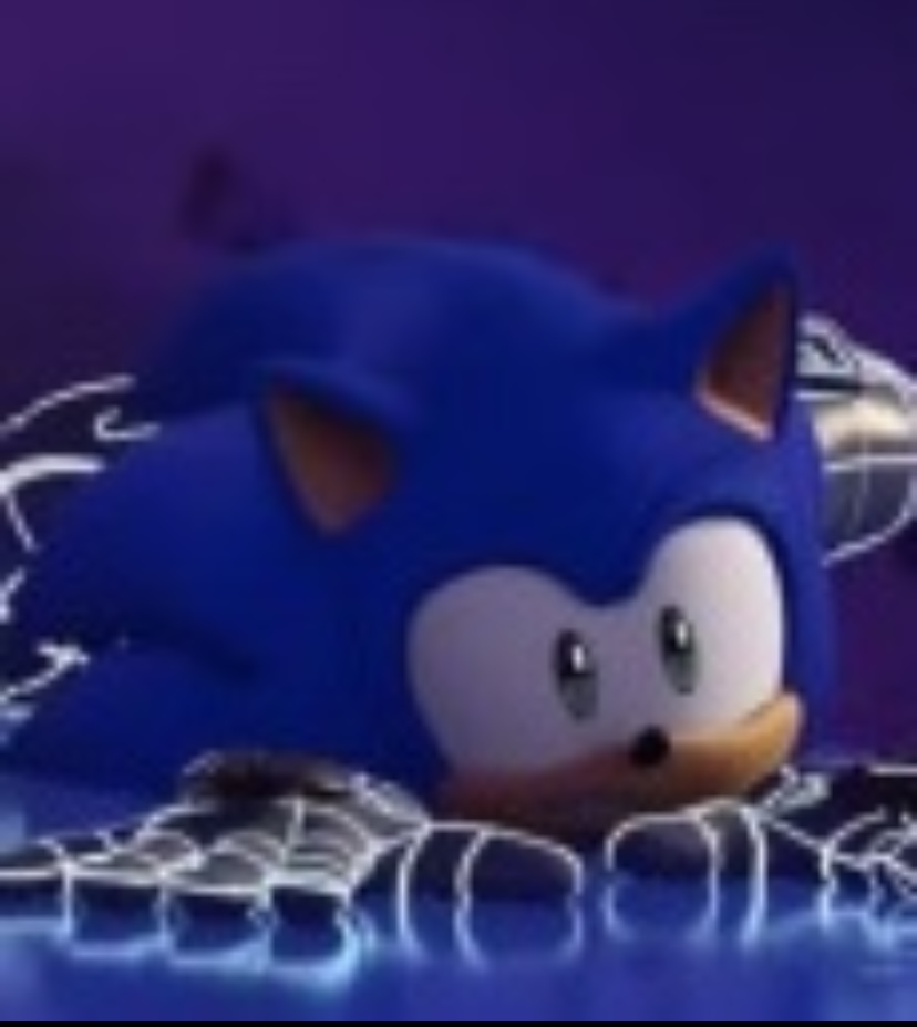 Screenshot of Sonic Prime. Sonic is splayed flat on his stomach, eyes wide.