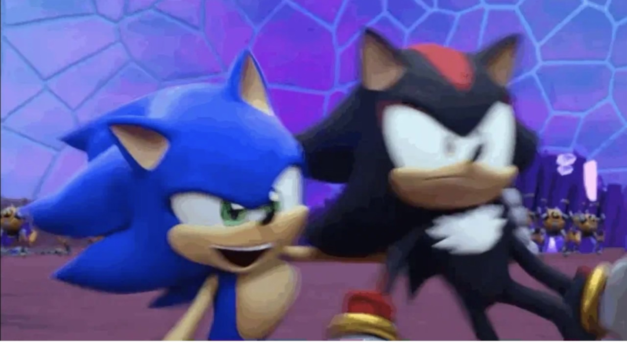 Screenshot of Sonic Prime, right after the ones above. Sonic is frozen mid-motion, mouth open and eyes squished, pulling Shadow along with him. Shadow's eyes are wide and his face is indignant and taken off guard.